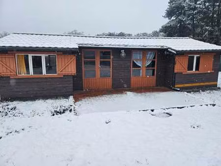 terrain de loisir plein sud avec chalet et annexes