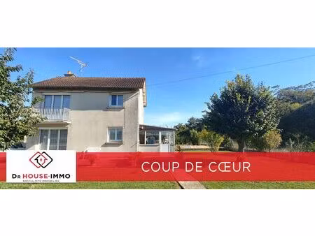 pavillon 90 m² habitables - 3 chambres - 2 garages - dépendances et terrain de 1050 m²