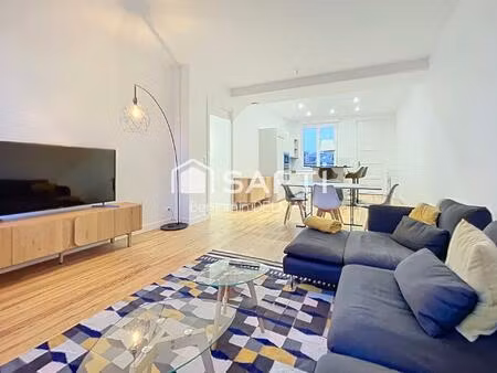 t3 rénové - immeuble en pierre avec ascenseur