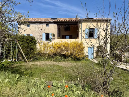 belle maison familiale en pierre sur 1 500 m² de terrain constructible à ucel