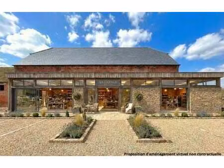 lot 3 – surface commerciale vitrée côté parking (± 140 m²)