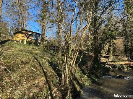 vends terrain boisé avec chalet et garage - bordure de rivière, plein sud. particulier à p