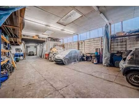 hangar avec fosse, pont et atelier pret pour votre activite