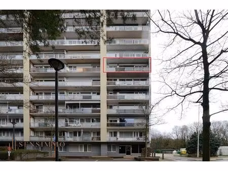 lichtrijk en ruim 4 slaapkamer appartement met parking vlakbij genk centrum!