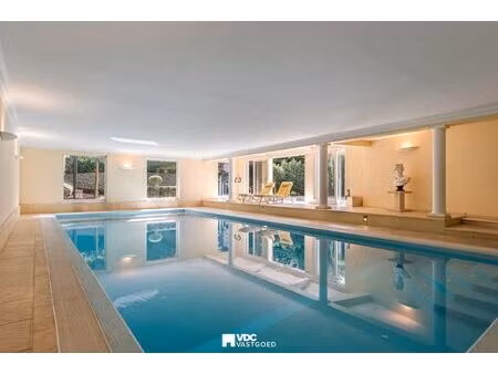 unieke villa met kantoorruimte, binnenzwembad en opsplitsingsmogelijkheid – tongeren/borgl