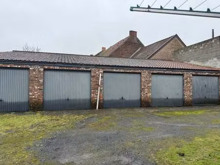 lot de 5 garages et terrain constructible pour projet de 5 a