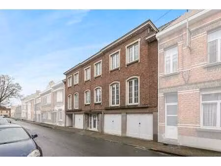 immeuble de rapport avec 4 appartements et garages