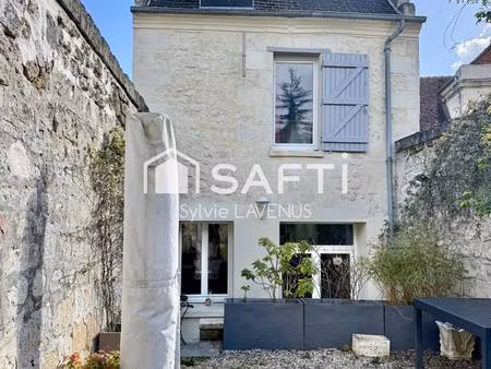 a soissons 02, maison de ville de 179 m2 avec 4 chambres, parking et cave sur terrain de 1