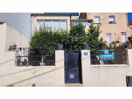 maison de ville avec jardin composée de 2 appartements '