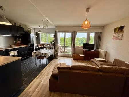 appartement 50m² - 2 pièces lumineux avec balcons - secteur recherché de nevers - investis