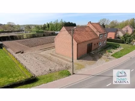 renovatie of verkaveling: ruime langgevelhoeve op 18a te betekom