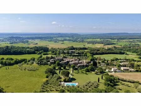 elegant character property in the heart of a preserved hamlet, just minutes from uzès with