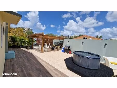 rooftop d’exception 200 m² avec jacuzzi – vue panoramique – acajou le lamentin