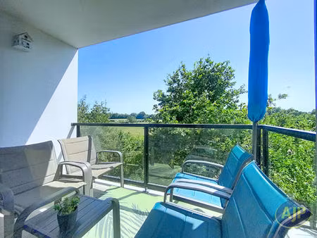 appartement t3 avec balcon, terrasse sud-ouest et parking en sous-sol