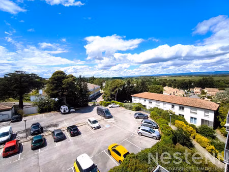 appartement t2 avec balcon vue dégagée, ascenseur, parking privatif et résidence sécurisée