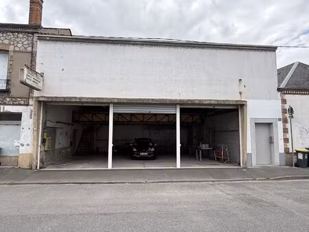rabelais, garage de 100m² au sol divisible en 3 garages doubles