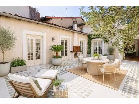 maison de ville avec terrasse, garage et local commercial