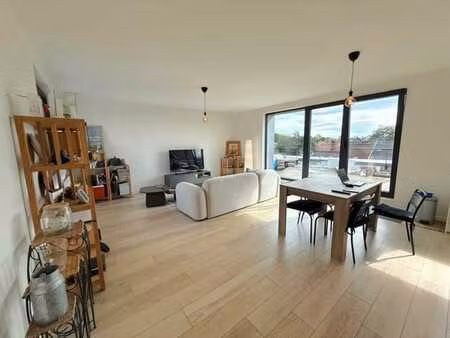 calevoet / lycee francais : penthouse immeuble basse énergie