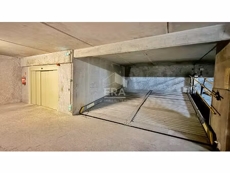 a vendre: lot de 2 places de parking avec système hydraulique