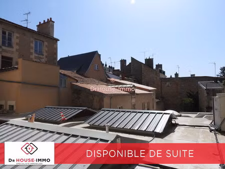 bel appartement de caractère de 56m2, idéalement bien placé.