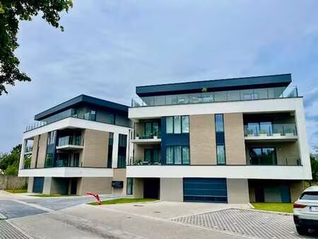 superbe appart neuf (1ère occup.) 2 ch 2 balcons 1 pkg peb a