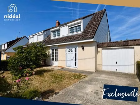 masion semi-individuelle avec garage et jardin à améliorer