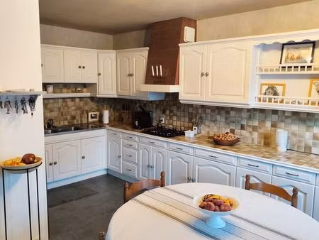 maison en location 65 m2 garage ,cave et terrasses