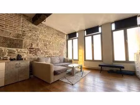 appartement en duplex situé en plein centre-ville.