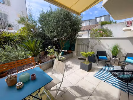 rare en hyper-centre - t3 en rez-de-jardin avec terrasse, jardin et parking - quai louis d