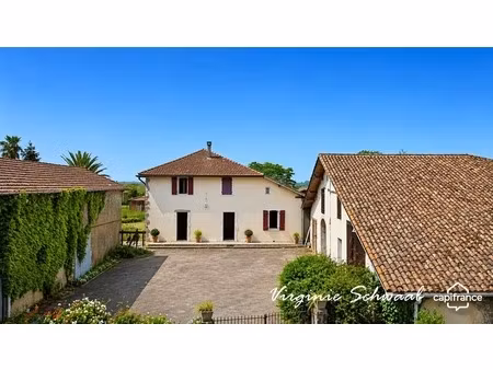 tilh (40) – maison de 9 pièces avec dépendances sur plus de 3 000 m² de terrain