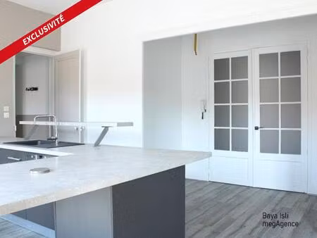 magnifique appartement traversant de 135m² avec un garage, grenier et cave