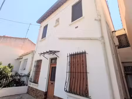 maison divisée en 2 appartements t3 avec jardins et garage