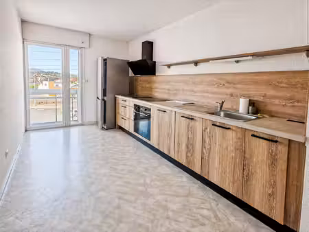 beau 4 pièces de 84 m² avec garage, cave et balcons