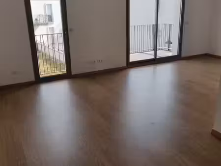 appartement arcade rougé, avec balcon et parking t1bis