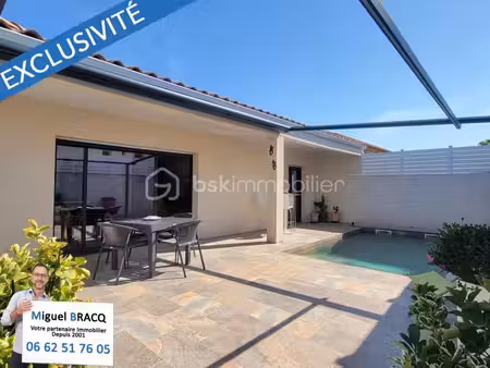villa contemporaine f4 de plain-pied avec piscine et grand confort de vie sur nissan-lez-e