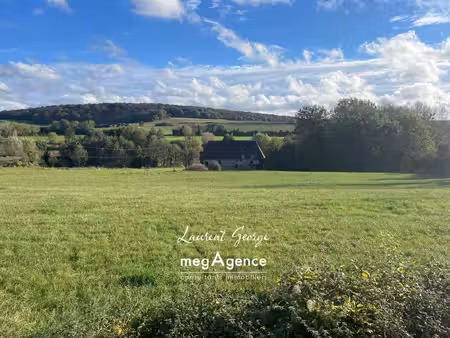 terrain constructible 2084 m2 environ