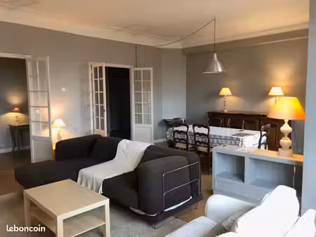 bel appartement ancien traversant avec balcons et vue
