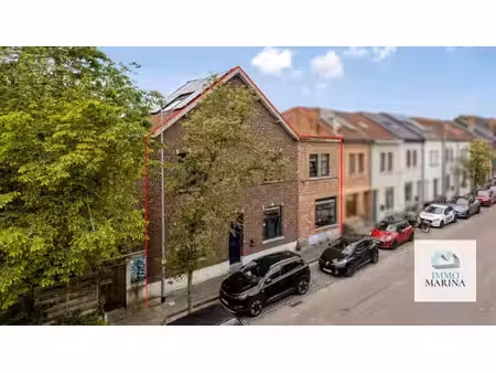 zeer ruime karakterwoning met 9 kamers en tuin op toplocatie te leuven