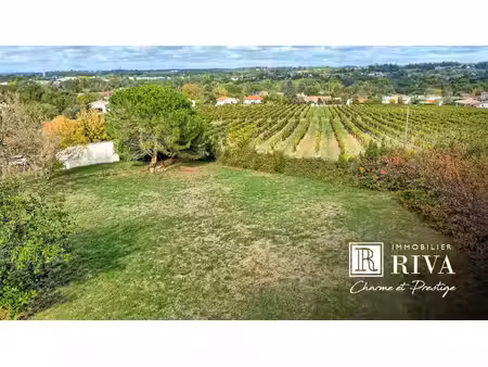 terrain constructible 1308 m2 - au calme - centre bourg