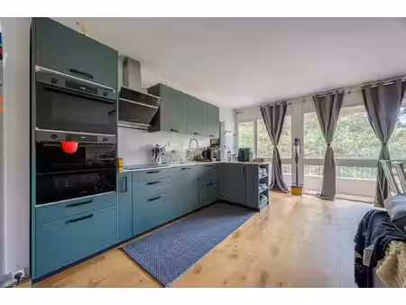 appartement t4 traversant avec balcons, garage et parking