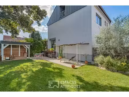 maison des années 60 rénovée et son jardin arboré