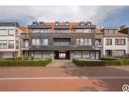 zonnig duplex-appartement met 3 slaapkamers en garagebox.