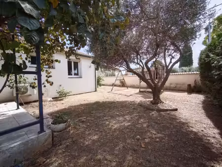 maison plain pied , cœur de village avec jardin