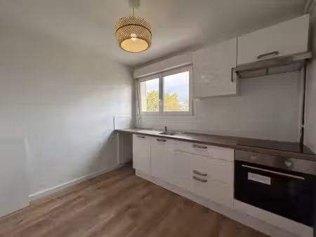 appartement 3 pièces de 70m2 avec balcon et cave
