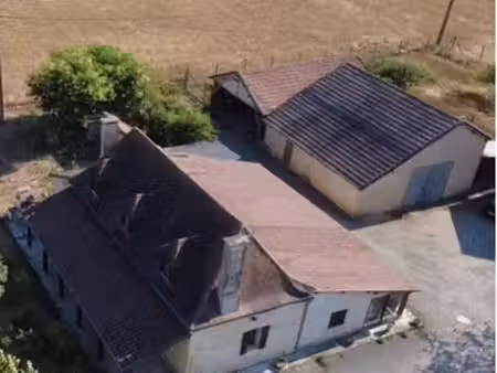 ferme avec maison et hangars