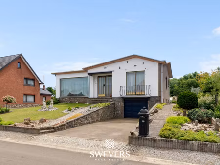 gelijkvloerse woning op ruim perceel van 9a 25ca