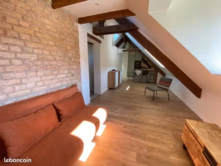 appartement en dernier étage avec rooftop  refait à neuf