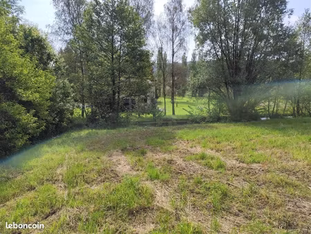terrain 1800 m² dommery