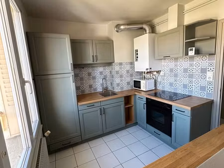 t3 53 m² traversant et lumineux  cave + garage  quartier calme
