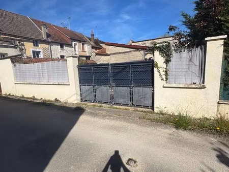 vente terrain + garage transformable en habitation